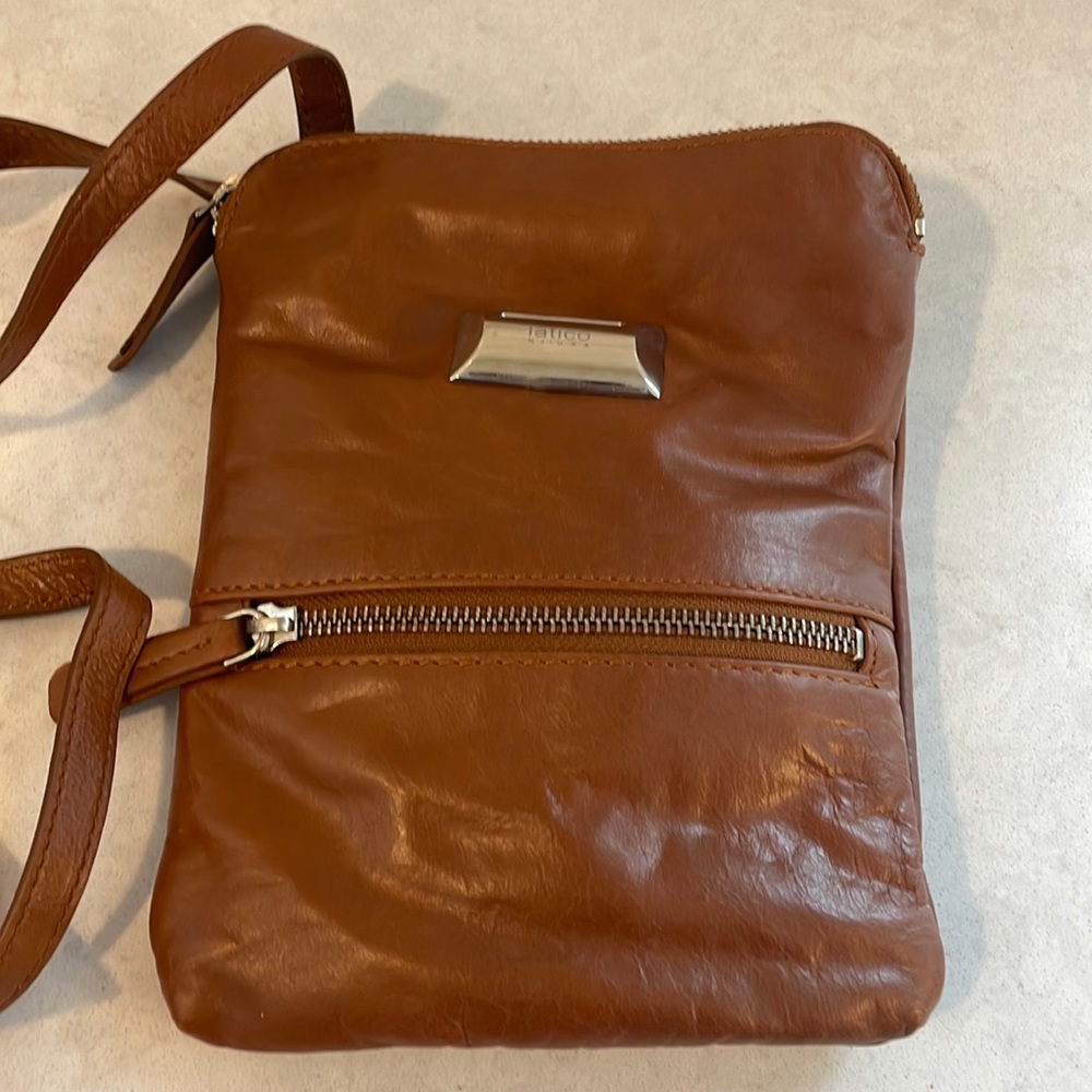 Cross body or just over the shoulder